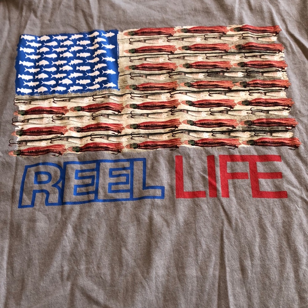 Reel Life T. Never worn.